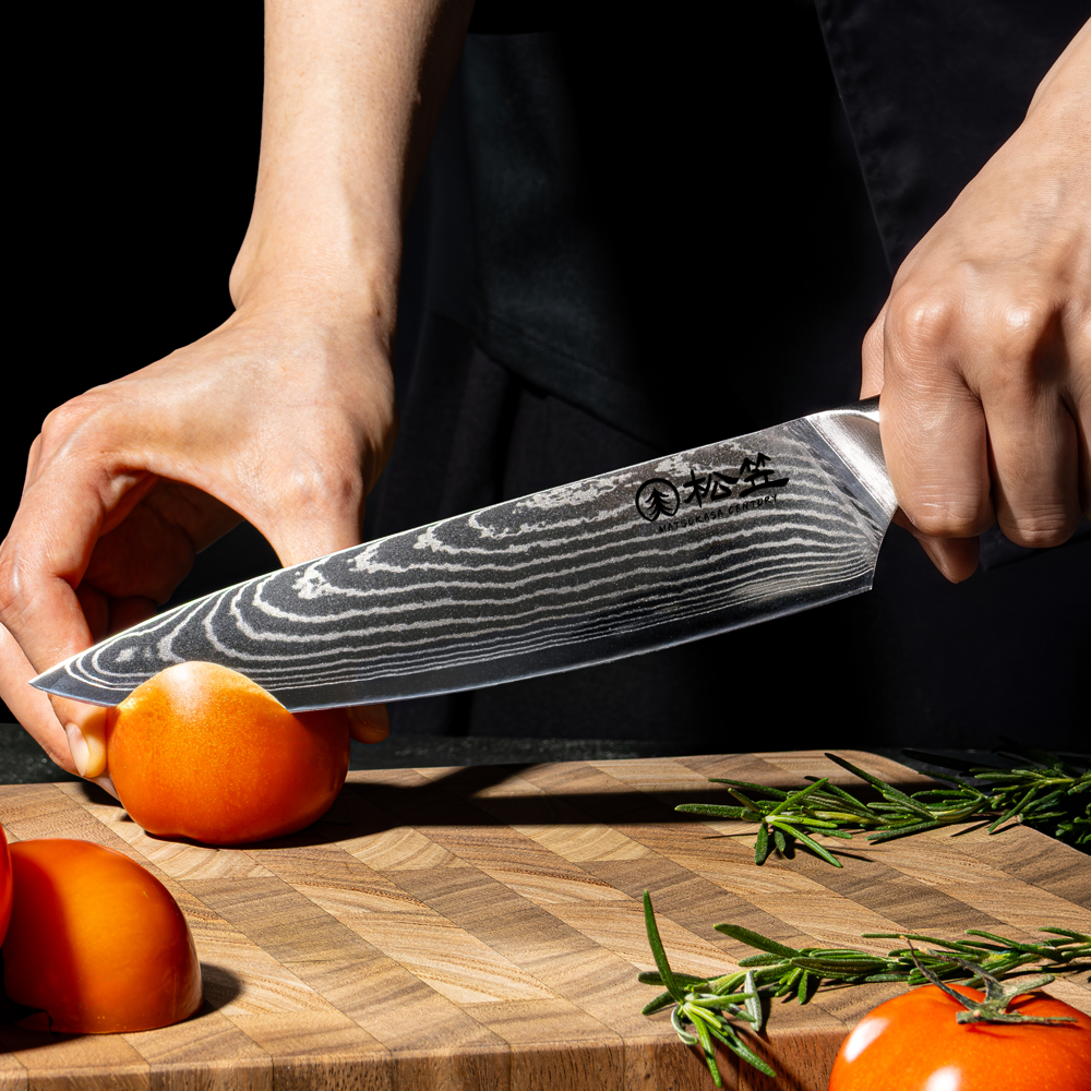 MATSUKASA CENTURY gyuto gliding through a tomato