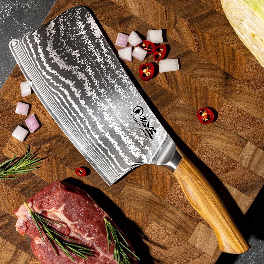 MATSUKASA CENTURY cleaver on a wooden board